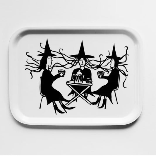 The perfect tray for serving a cup of tea or coffee with a few treats.  Every Swedish household has a selection of this style of tray, and this is one featuring one of  Anna Brones's papercuts, "Witch Fika."  The tray is made for the simple moments. Place your mug on the tray, slow down and savor. Tray measures 8x10.5" (20x27cm). Anna Brones Witch Fika Tray