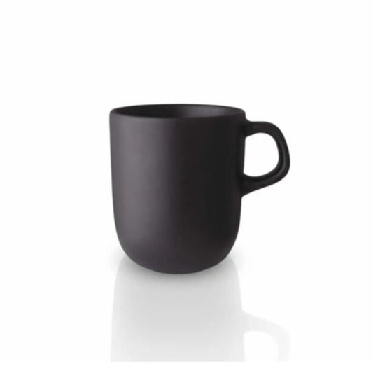 Eva Solo Stoneware Cup 30cl A minimalist design and a functional mindset. This is the essence of Scandinavian design, and what has inspired the Nordic kitchen stoneware range. A simple and stylish design in black stoneware that adds a rustic look to match the Nordic easy-going lifestyle. With its simple shape and warm black hue, the stoneware cup is stylish and solid enough to be used every day.