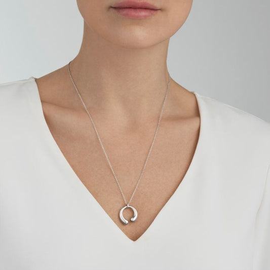 The Mercy collection was created by Jacqueline Rabun. As is typical when Rabun and Georg Jensen collaborate, the designs are both sculptural and bold, yet the different pieces have a playful and contemporary feel that make them easy to style with other jewellery – and allow the wearers to create their own personal expression. GEORG JENSEN Mercy Medium Pendant 634B Silver